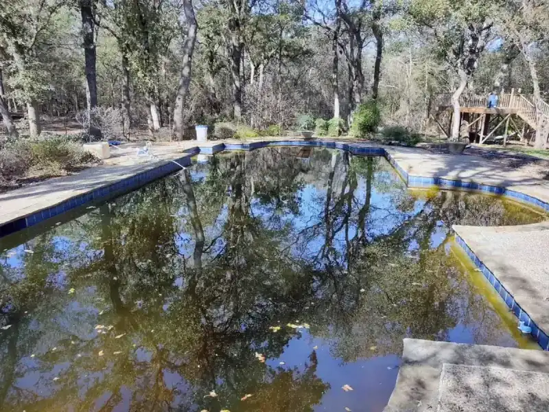 Fire-damaged swimming pool documented during a claim inspection