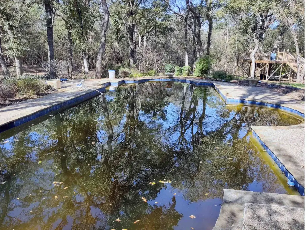 Fire-damaged swimming pool documented during a claim inspection