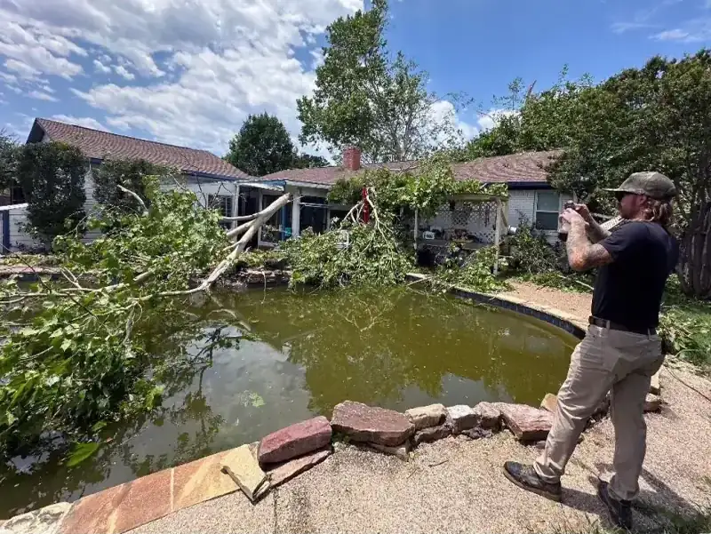Storm-damaged pool area documented during a claim inspection