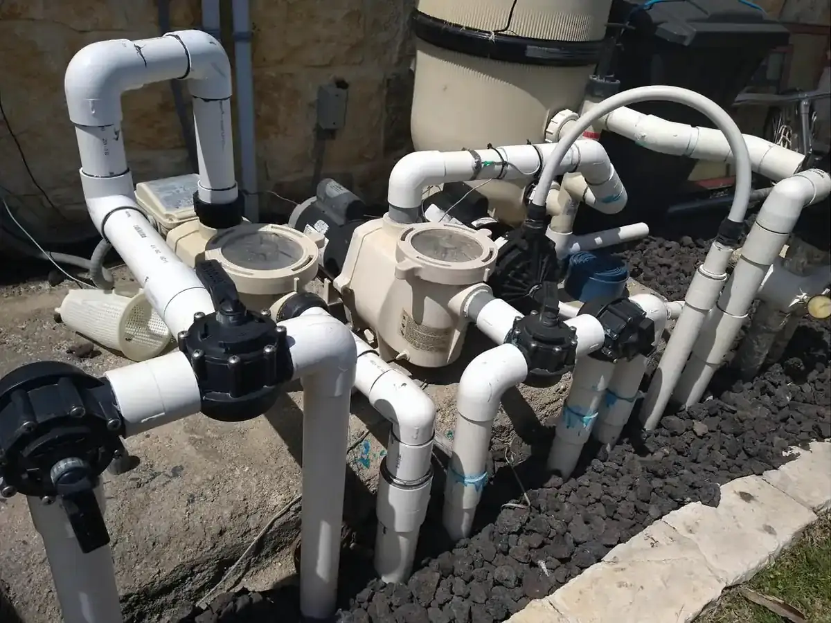 Freeze-damaged pool equipment documented during a claim inspection